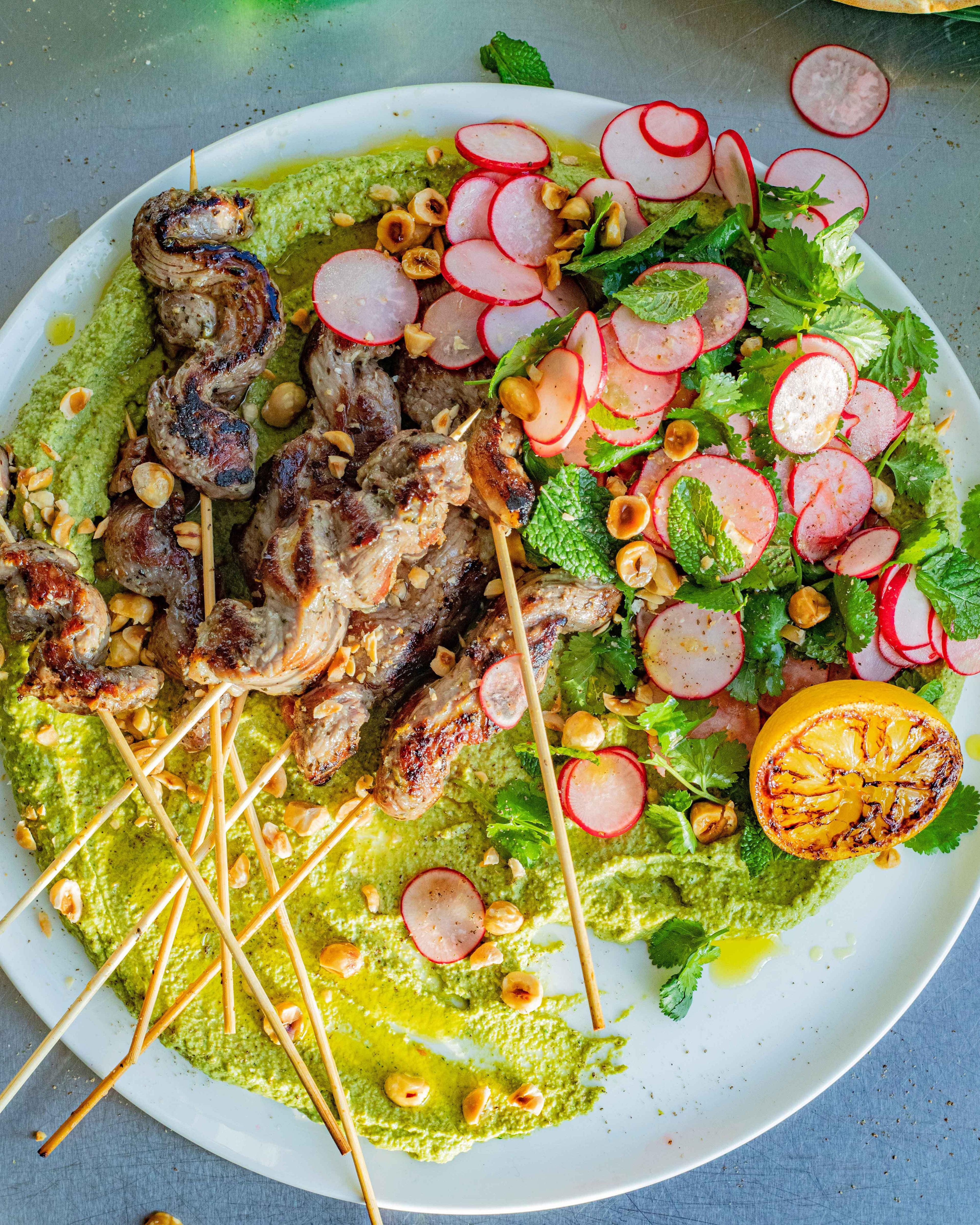 Lamb Kebabs On Minted Green Romesco With Radish Salad