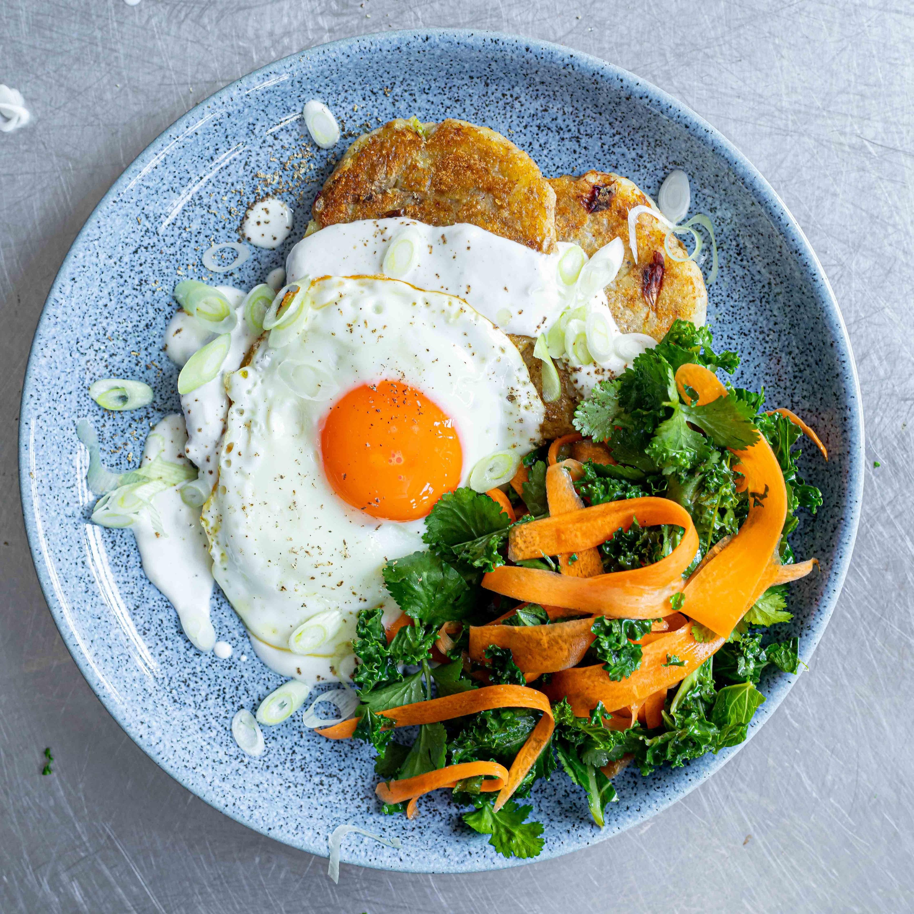 Spiced Potato Cakes With Carrot Slaw and Poached Eggs