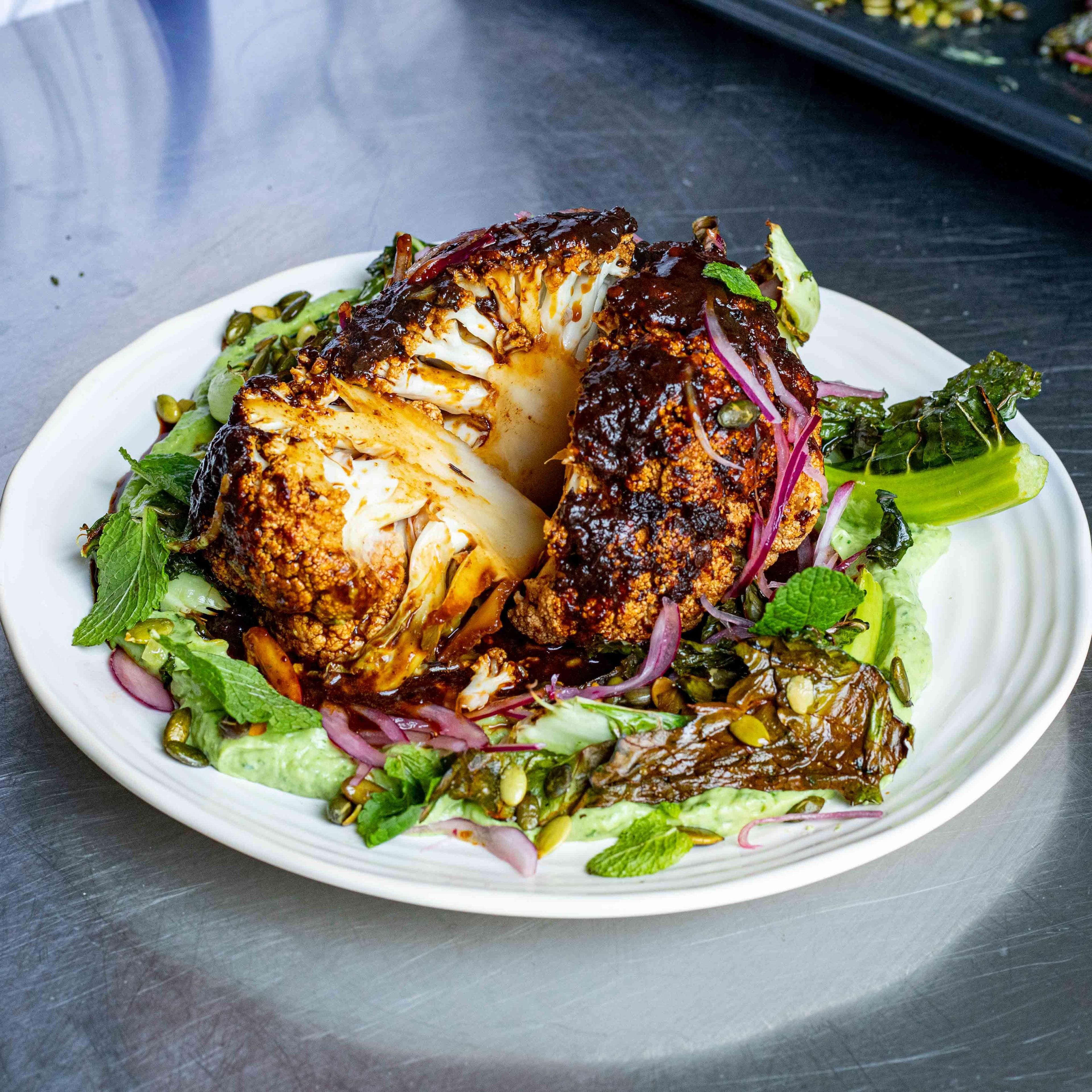 Whole Roasted Chipotle Cauliflower With Avocado Crema