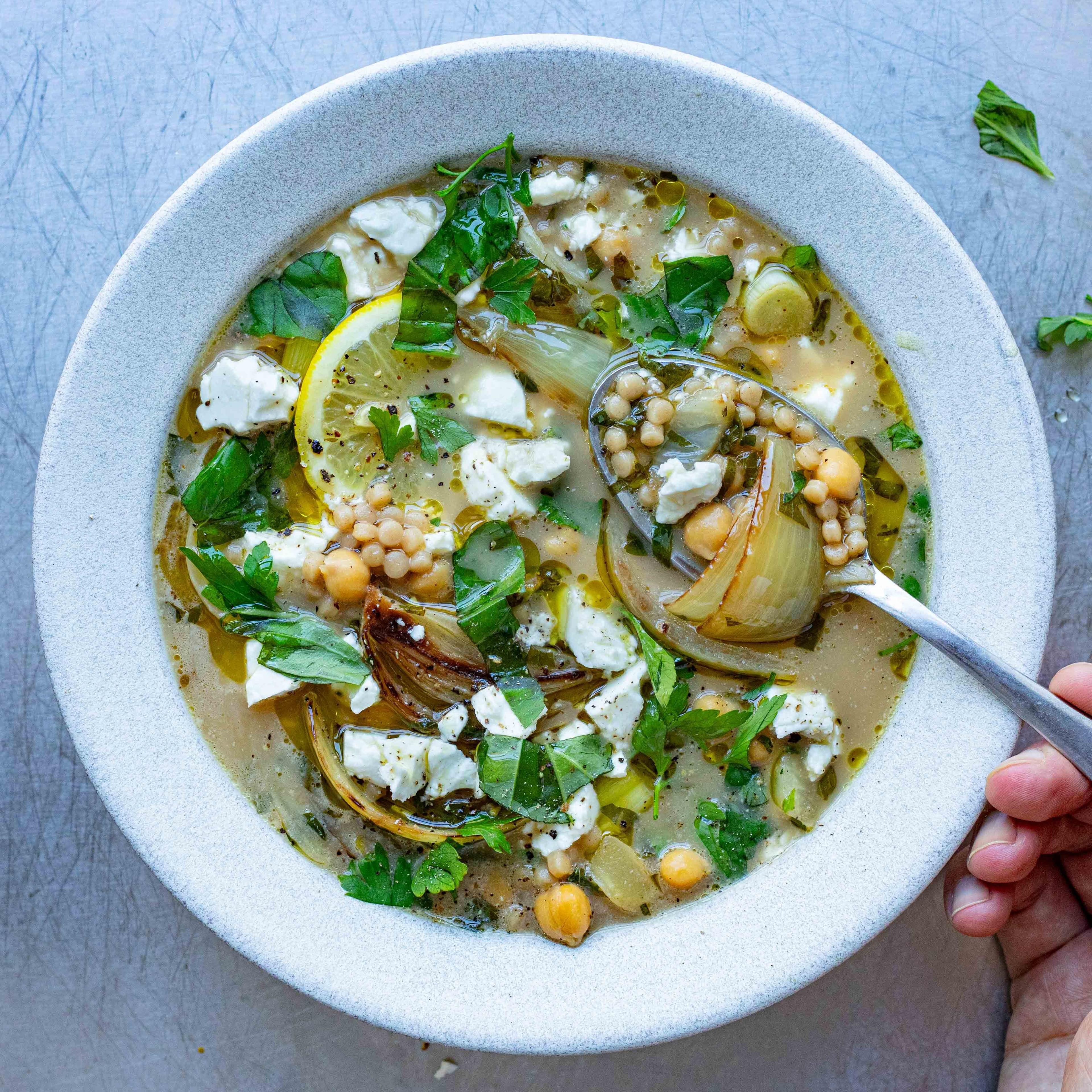 Charred Onion and Fennel Broth with Fregola, Chickpeas and Feta.