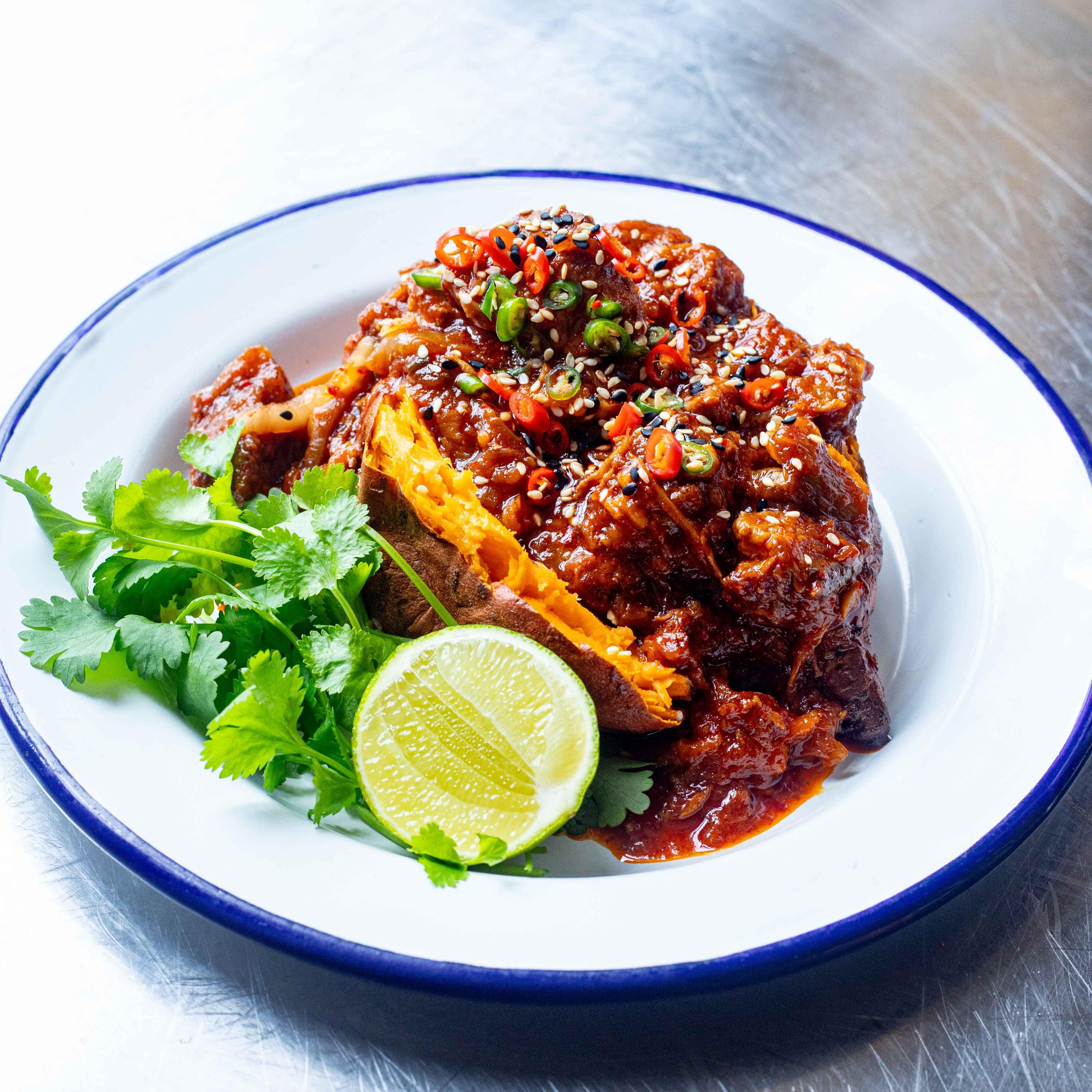 Baked Sweet Potato with Spicy Pork Ragu