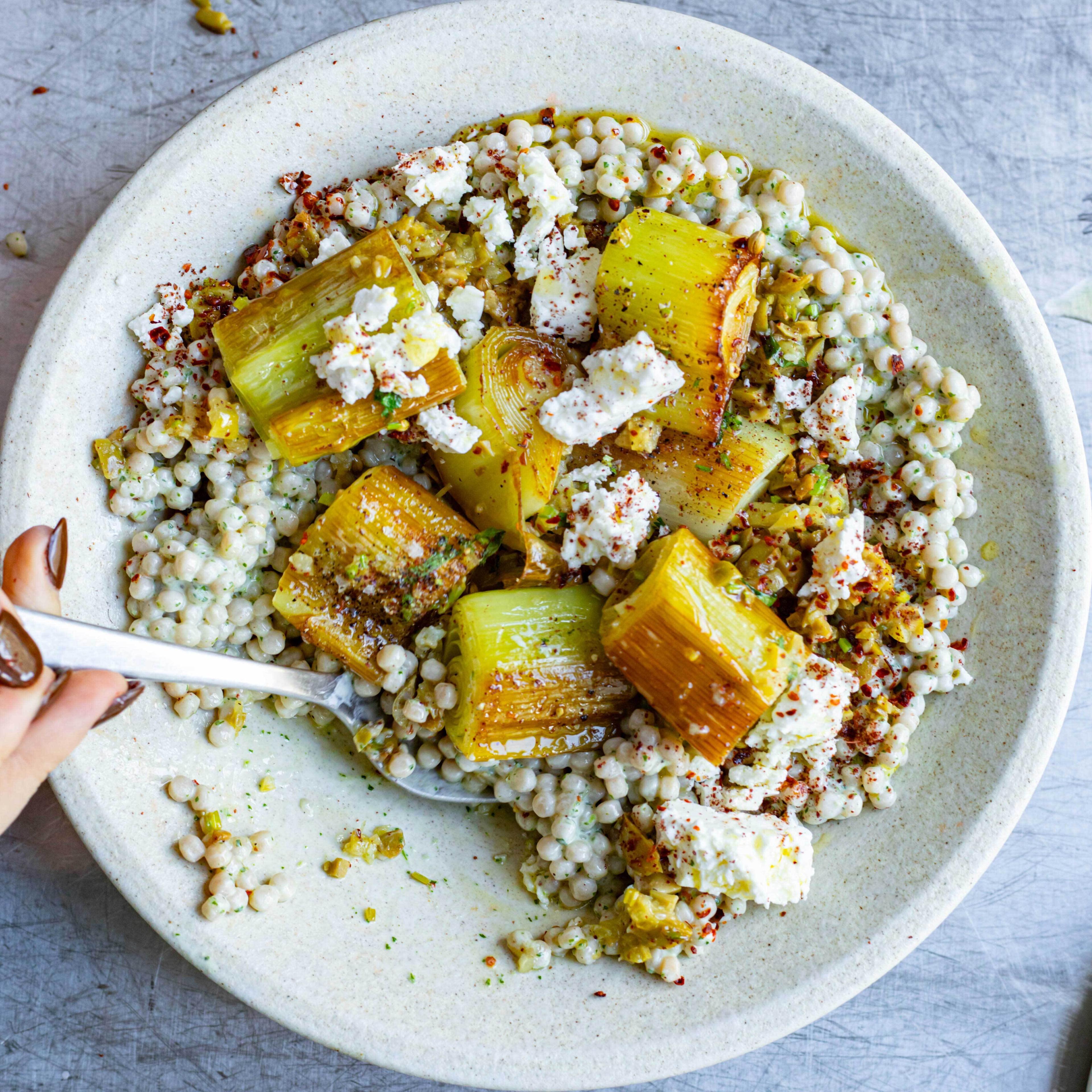 Olive Oil Leeks with Giant Couscous Yoghurt Dressing