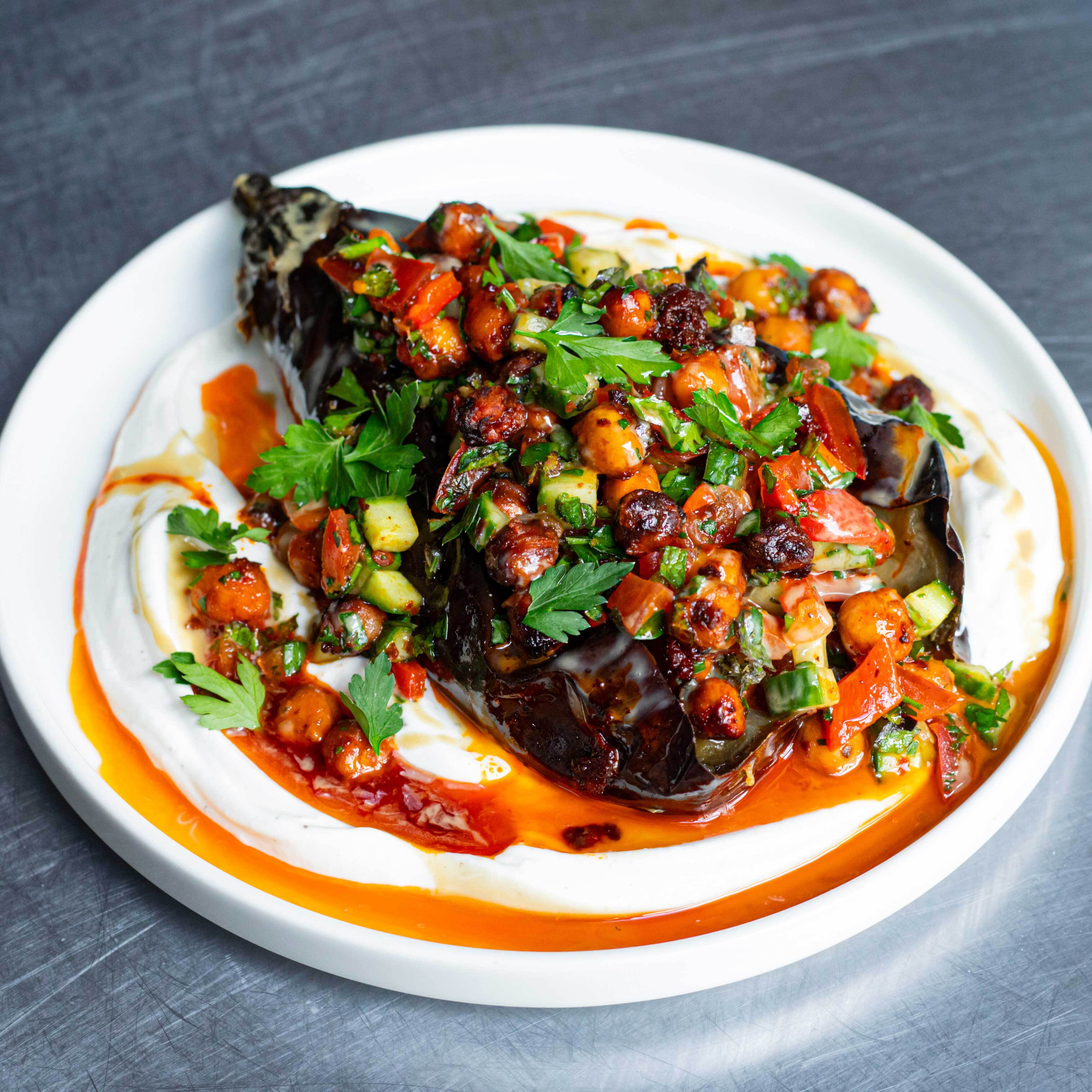 Whole Roast Aubergine With Harissa Chickpea Tabbouleh