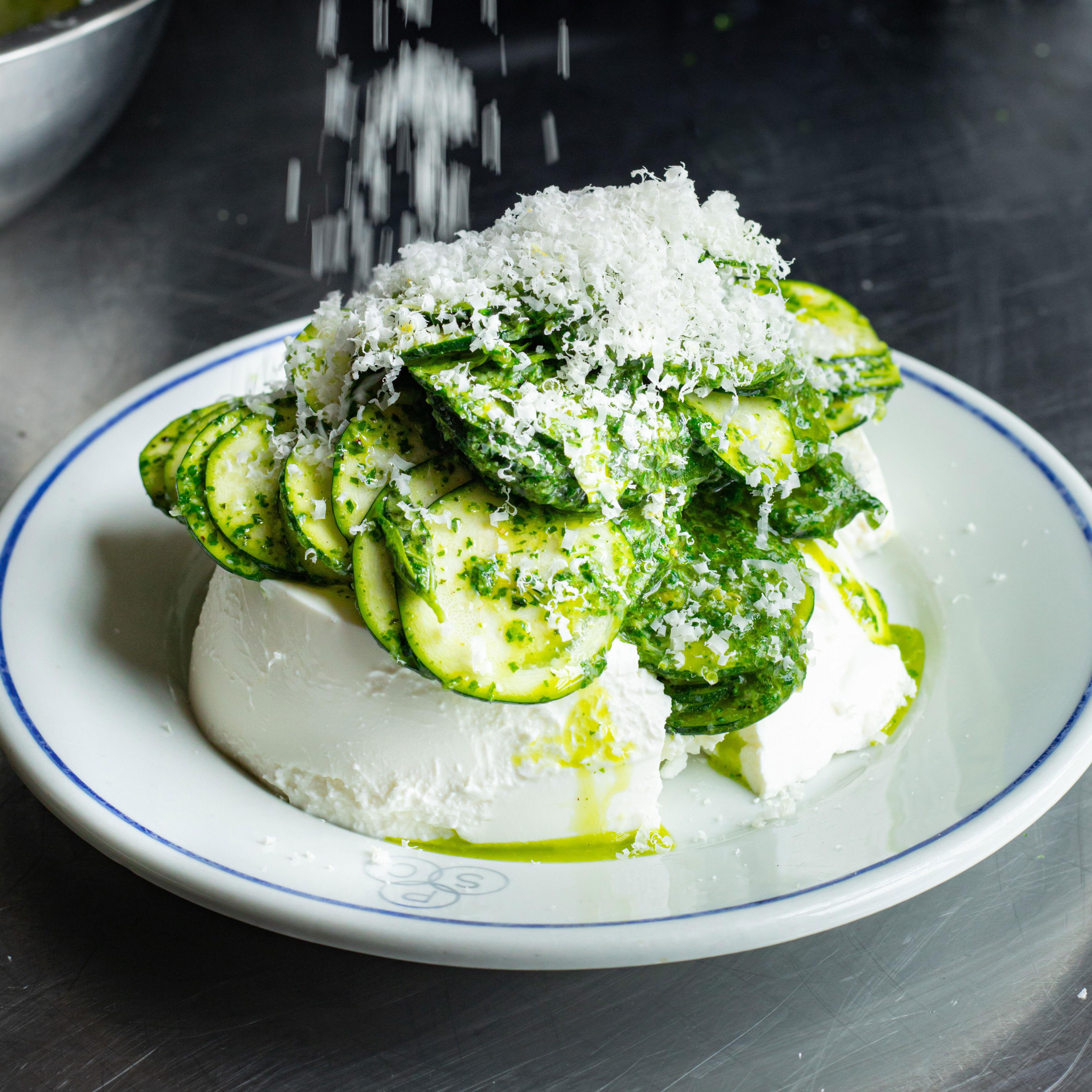 Raw Courgette Salad Over a Pot of Ricotta