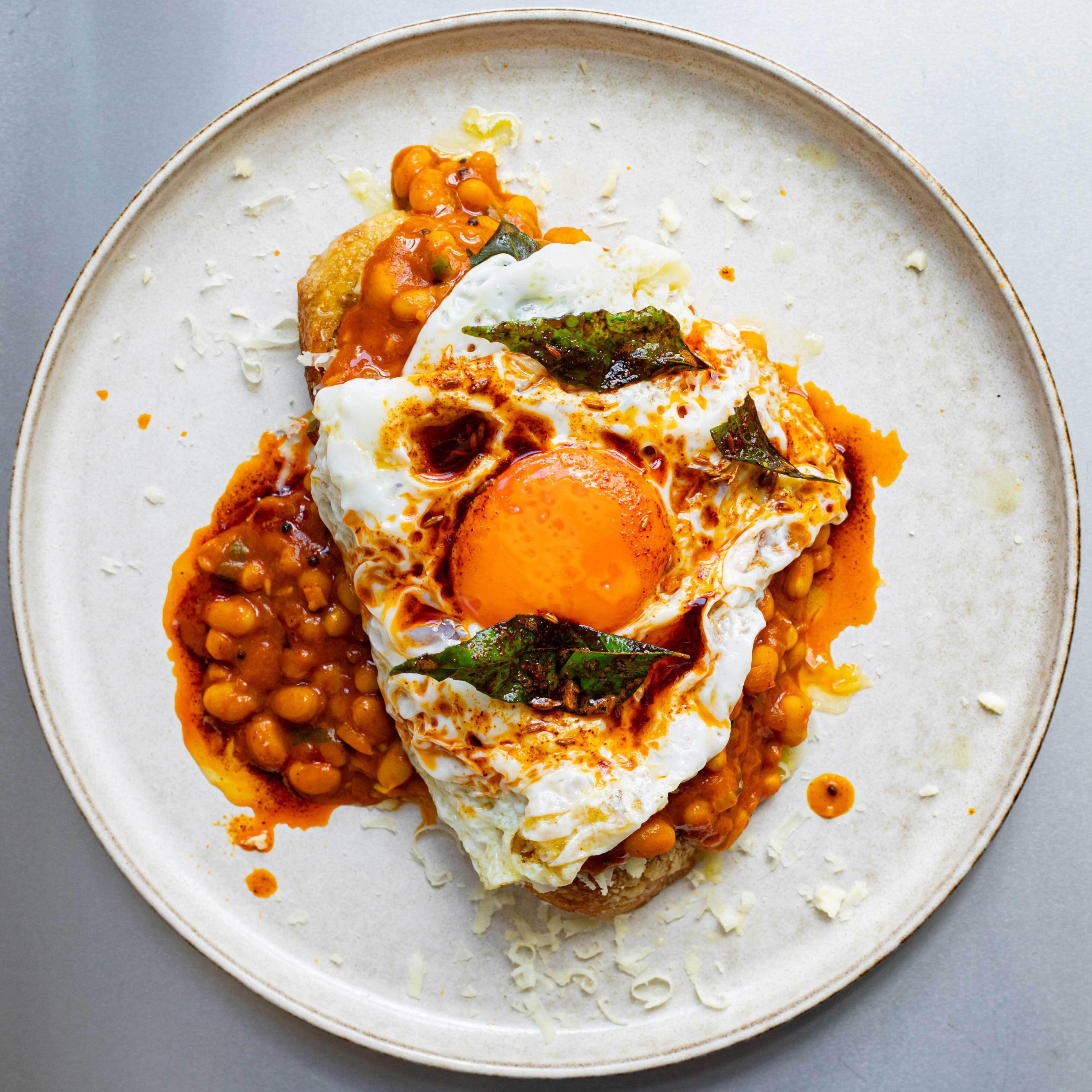 Loaded Masala Beans Eggs on Toast