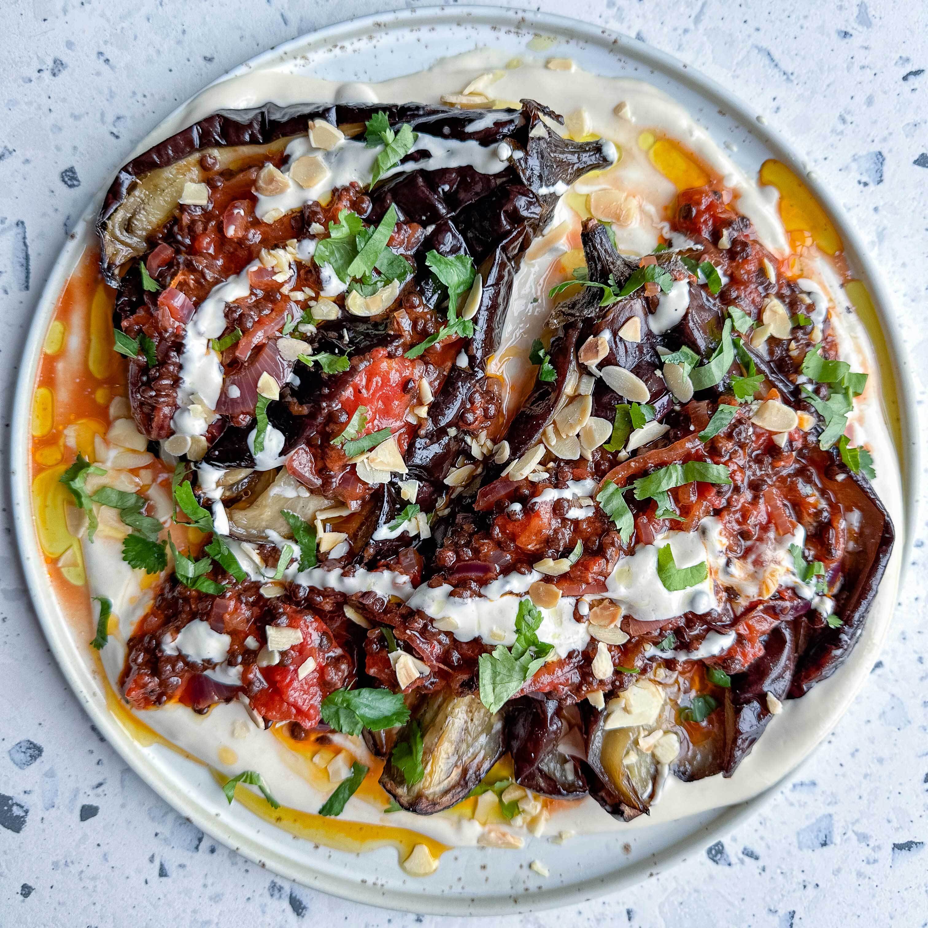 Sliced Aubergine with Harissa Lentil Ragu Whipped Tahini Sauce